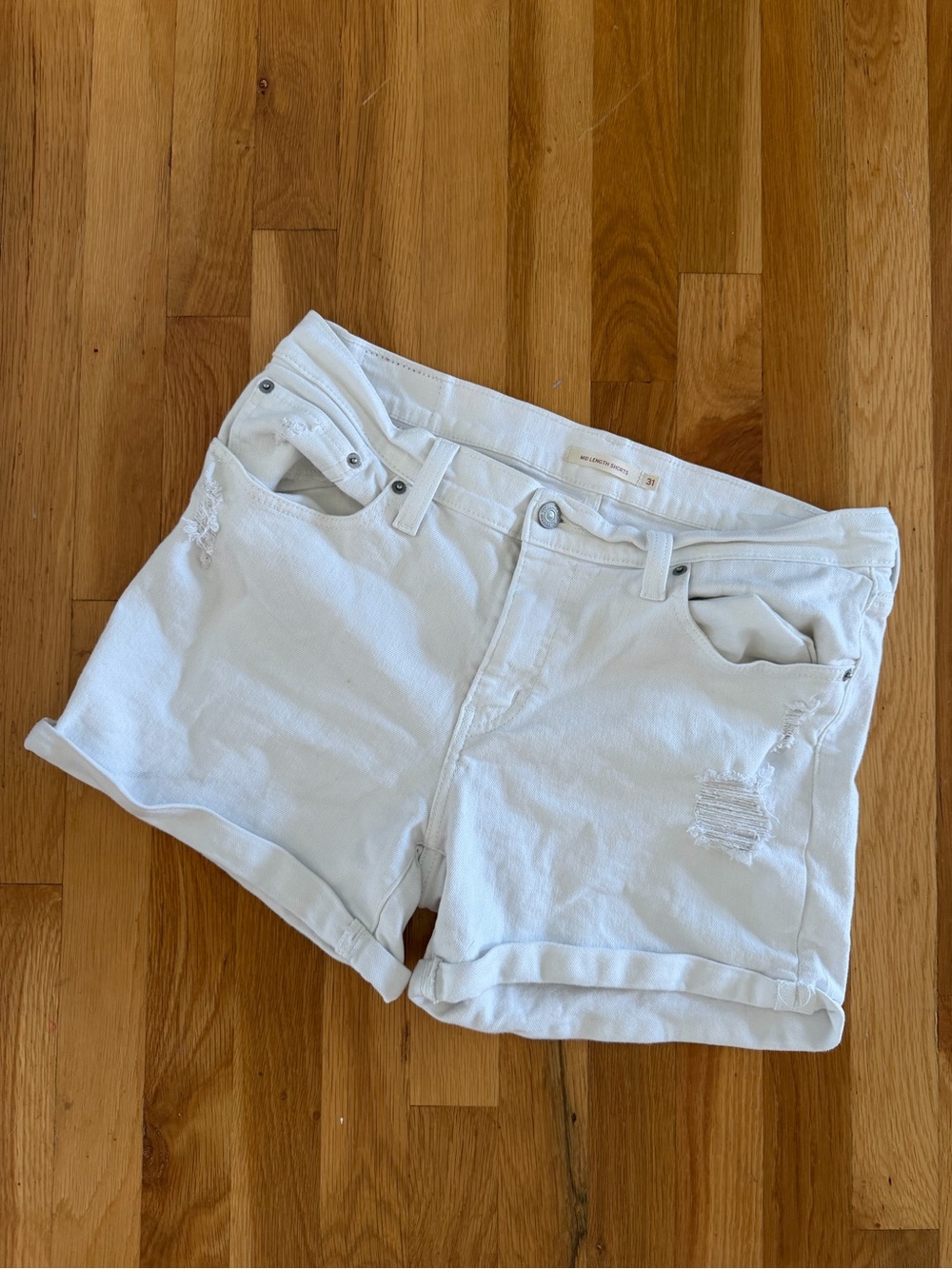 Levi's White Rolled Hem Distressed Denim Shorts